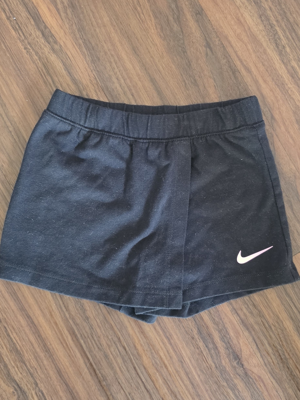 Nike Girl’s Black Athletic Shorts with Light Pink Swoosh